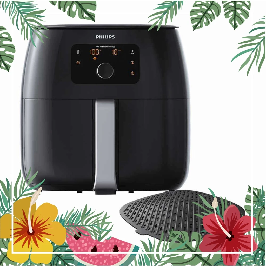 Máy chiên không dầu Philips Airfryer XXL HD9650/90 màu đen, có màn hình điều khiển kỹ thuật số và khay nướng, được đặt trong khung hình trang trí lá cây và hoa nhiệt đới.